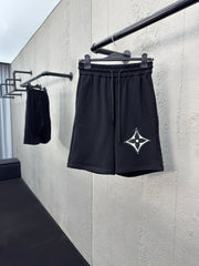 Applique four-leaf clover shorts