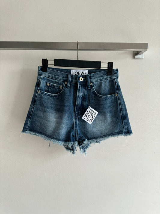 Raw-edge denim shorts