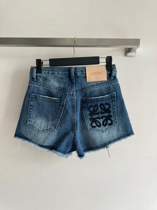 Raw-edge denim shorts