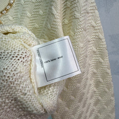 Chain-decorated round-neck cardigan