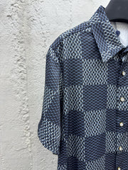 Cross-stitched leather jacket