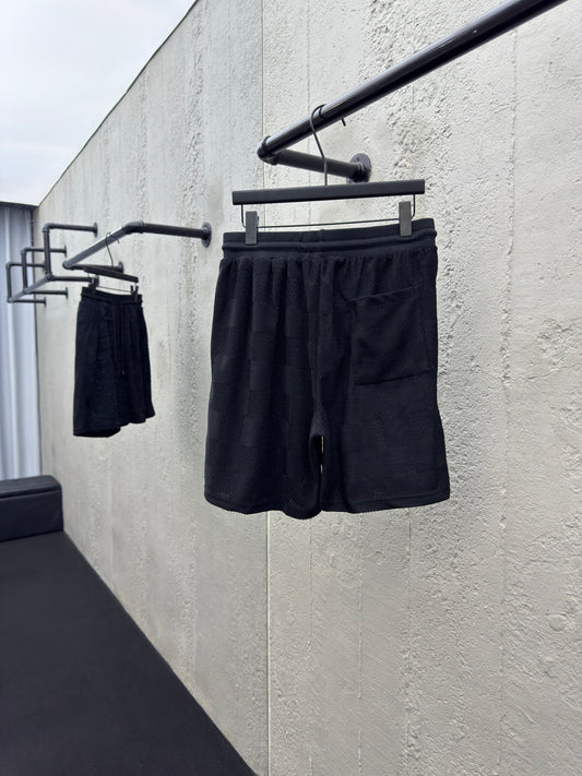 Checkerboard embroidered woolen shorts