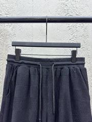 Checkerboard embroidered woolen shorts