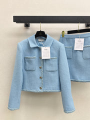 A blue, elegant, woven suit