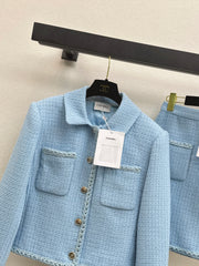 A blue, elegant, woven suit