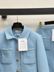 A blue, elegant, woven suit