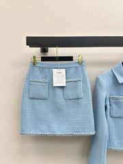 A blue, elegant, woven suit