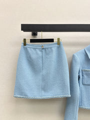 A blue, elegant, woven suit