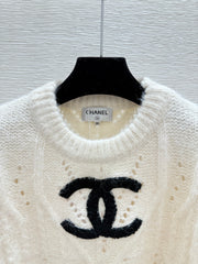 Solid color simple hollow round neck knitted long sleeves