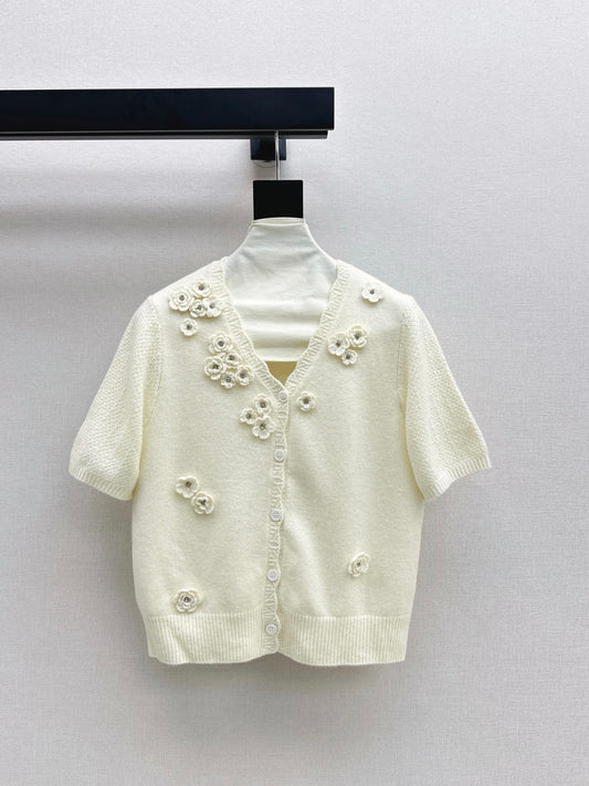 V-neck sweater with 3D floral embellishments