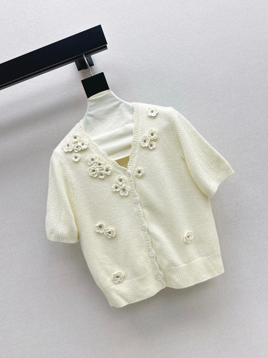 V-neck sweater with 3D floral embellishments