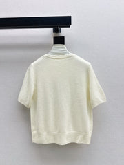 V-neck sweater with 3D floral embellishments