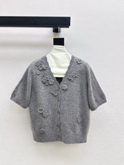 V-neck sweater with 3D floral embellishments