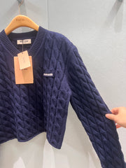 V-neck cable-knit cropped sweater