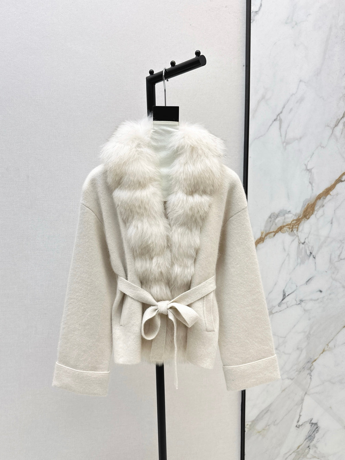 Fox fur-trimmed knitted coat