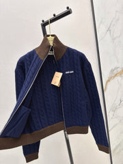 A stand-up collar jacket with contrasting trims