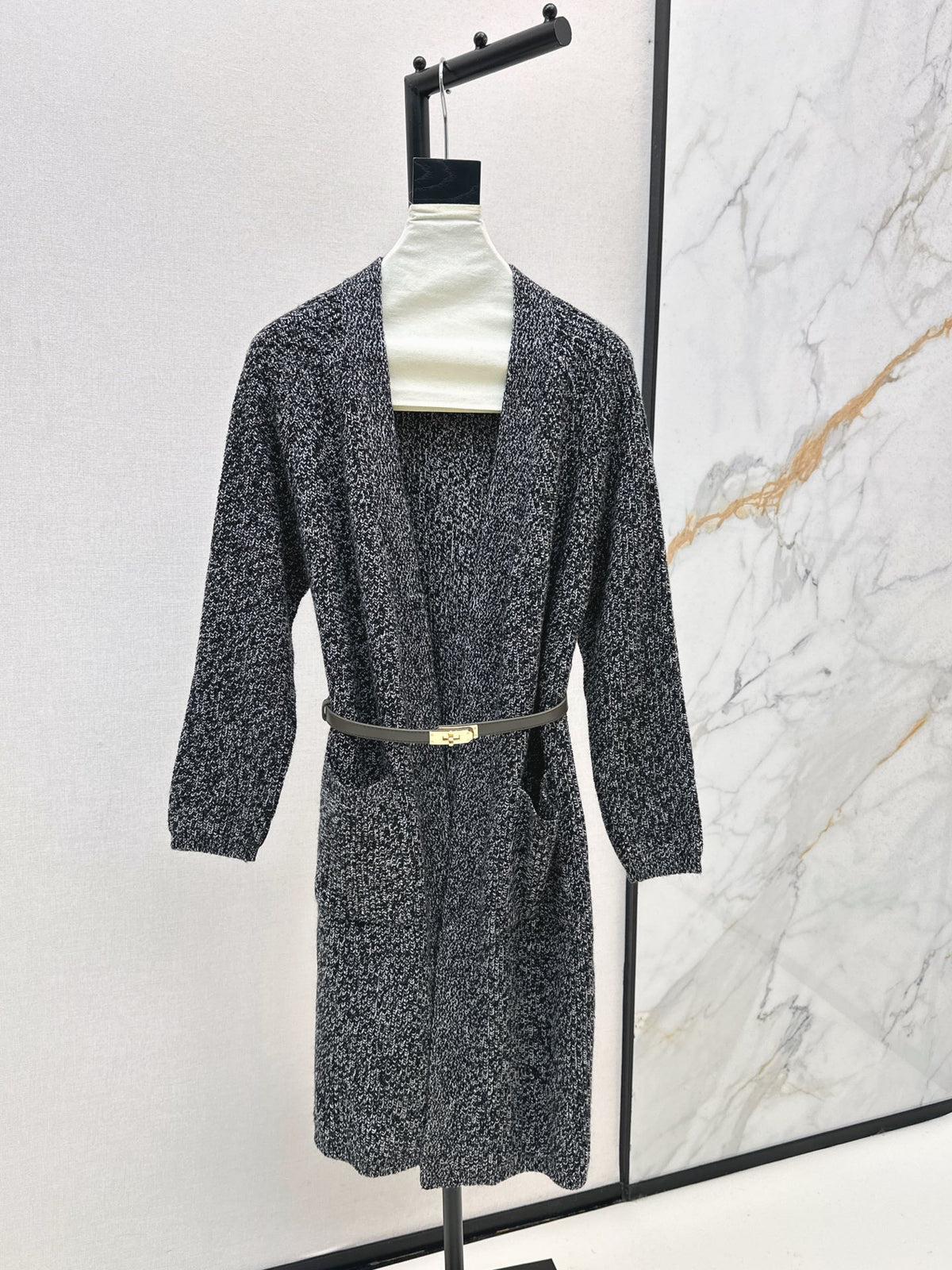 A relaxed mid-length knitted jacket