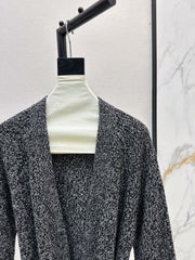 A relaxed mid-length knitted jacket