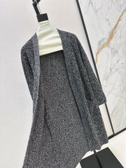 A relaxed mid-length knitted jacket