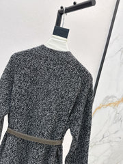 A relaxed mid-length knitted jacket