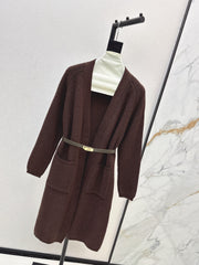 A relaxed mid-length knitted jacket