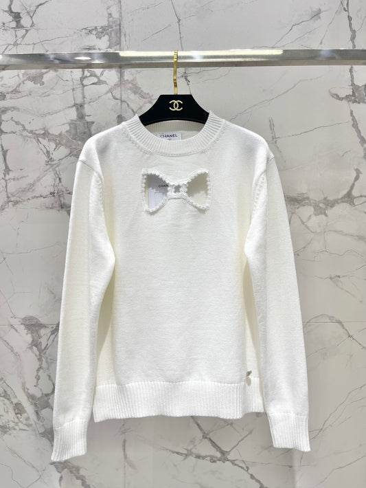 Bowknot hollow jacquard crew neck knitted sweater