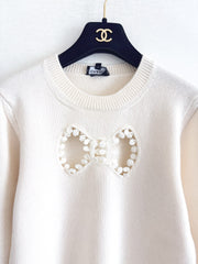 Openwork bow sweater