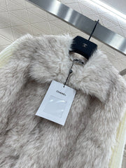 Knitted patchwork collared fur coat.