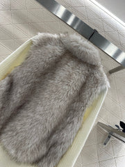 Knitted patchwork collared fur coat.