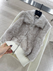 Knitted patchwork collared fur coat.