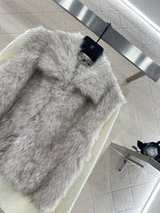 Knitted patchwork collared fur coat.