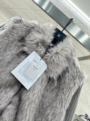 Knitted patchwork collared fur coat.