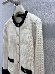 Black and white color-blocked wool knit cardigan