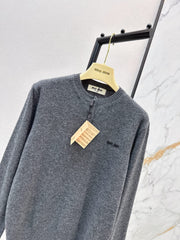 Half-button crew neck cashmere knit sweater
