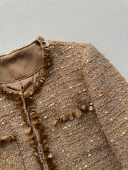 Gold sequined tweed Chanel-style jacket