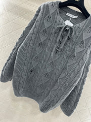 Crocheted drawstring pullover sweater