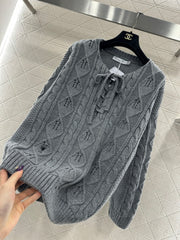 Crocheted drawstring pullover sweater