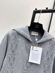 Half-open zip-up knit sweater