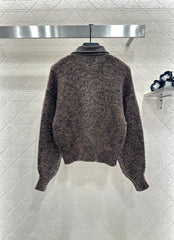 Leather-trimmed lapel knit zip-up jacket.