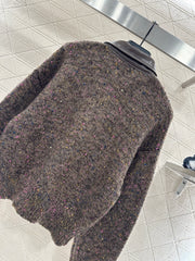 Leather-trimmed lapel knit zip-up jacket.