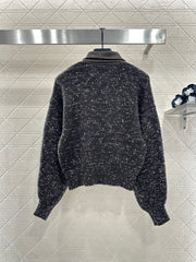 Leather-trimmed lapel knit zip-up jacket.