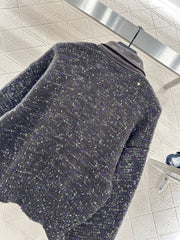 Leather-trimmed lapel knit zip-up jacket.