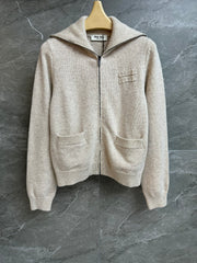 Oatmeal-colored knit cardigan