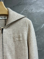 Oatmeal-colored knit cardigan