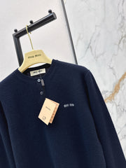 Half-button crew neck cashmere knit sweater