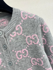 Pink and gray color-blocked crew neck cardigan