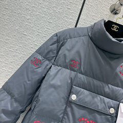 Hollowed-out, seam-sealed short down jacket