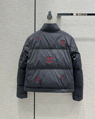Hollowed-out, seam-sealed short down jacket