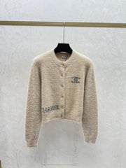 Color-blocked lettered crew neck knit long-sleeved cardigan
