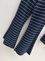 Navy blue flared trousers with beige pinstripes